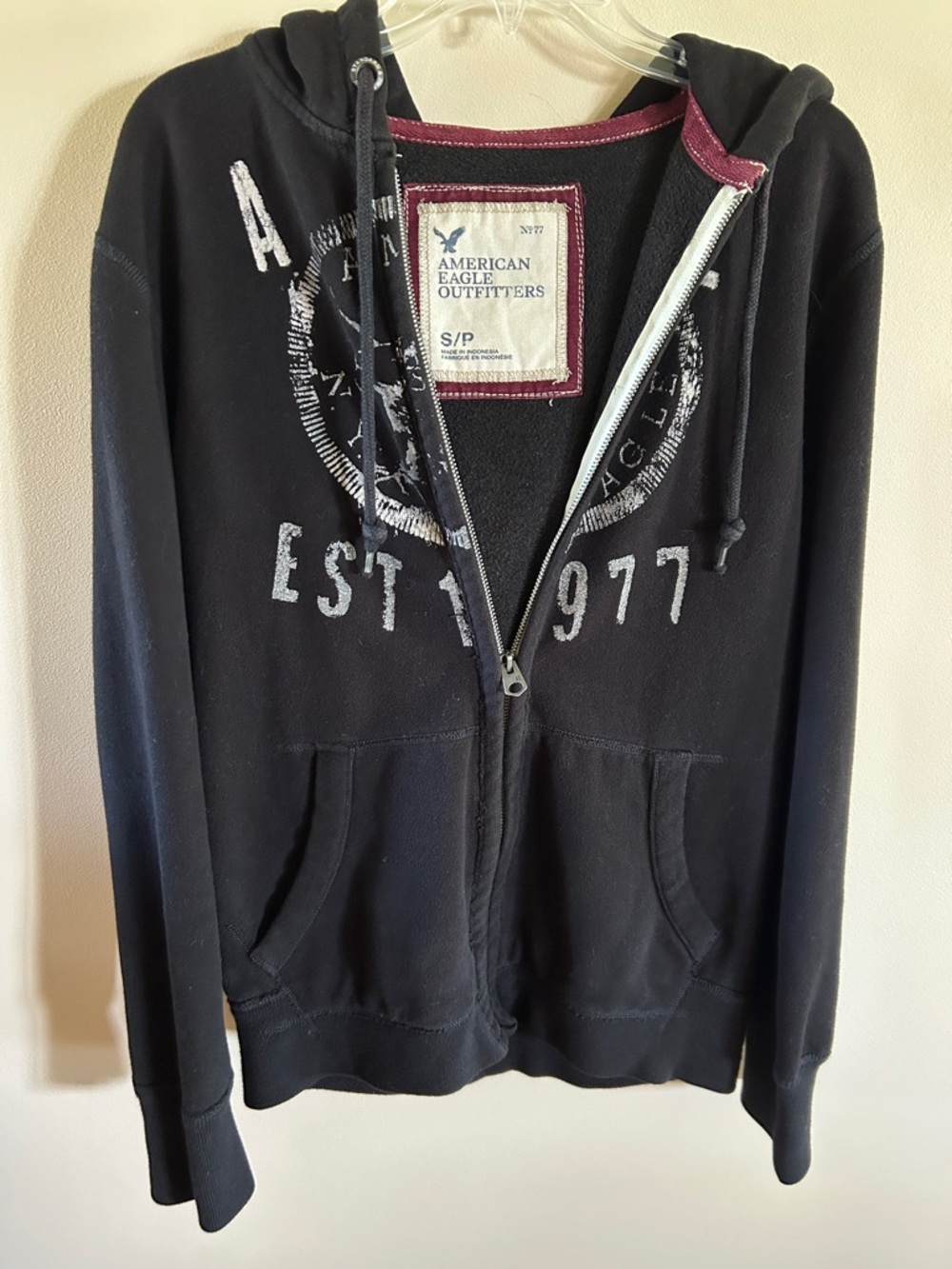 American Eagle Outfitters Black Zip Hoodie with White Graphic and Maroon Trim